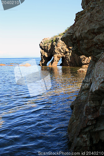 Image of Rock with the name "the Elephant drinking water". Russia. Island "Putjatin"