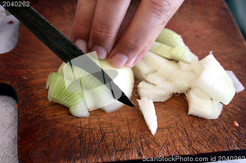 Image of Cutting of onions for salad