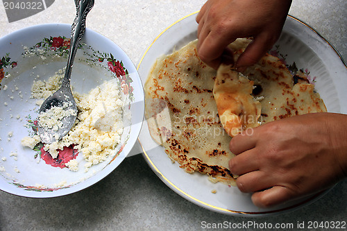 Image of Stuffed pancakes with cottage cheese