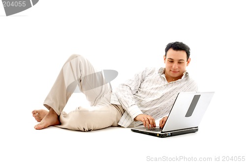 Image of relaxed man with laptop