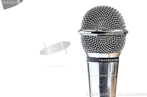 Image of closeup of old microphone over white background