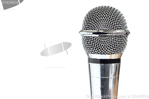 Image of closeup of vintage microphone over white background