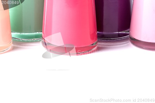 Image of Bottles with spilled nail polish