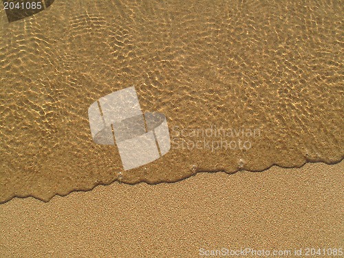 Image of Transparent sea wave on the sand