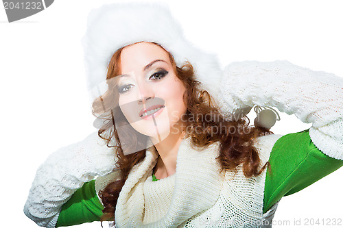 Image of beautiful girl with winter fur cap on isolated white