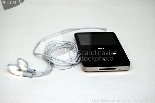 Image of Mp3 player with headphones