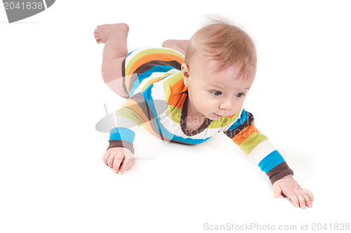 Image of Little baby in multicolored striped clothes