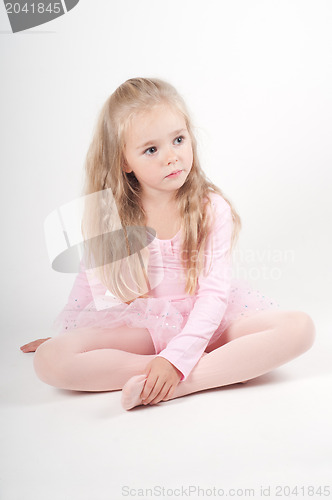Image of Ballet dancer sitting on the floor