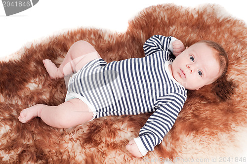 Image of Newborn baby in striped body