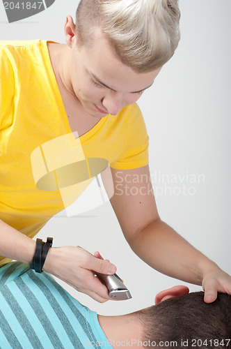 Image of Hairdresser working with razor