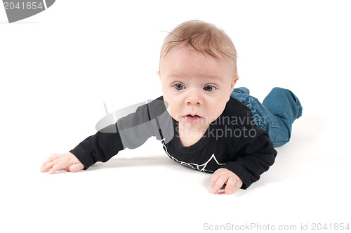 Image of Little baby in jeans and black top