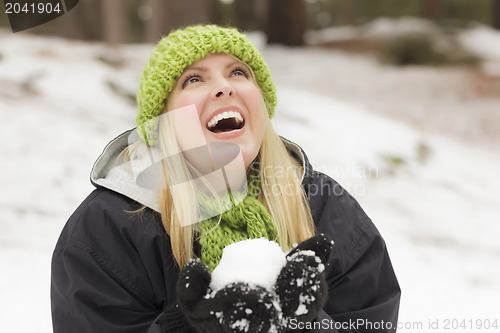 Image of Attractive Woman Having Fun in the Snow