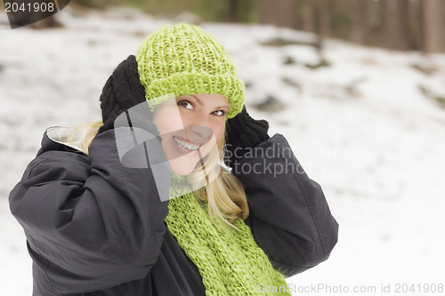 Image of Attractive Woman Having Fun in the Snow