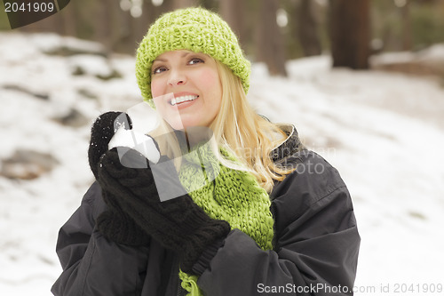 Image of Attractive Woman Having Fun in the Snow
