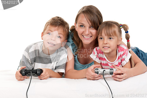 Image of Happy family playing a video game