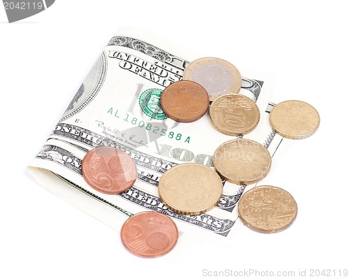 Image of Coins over bills