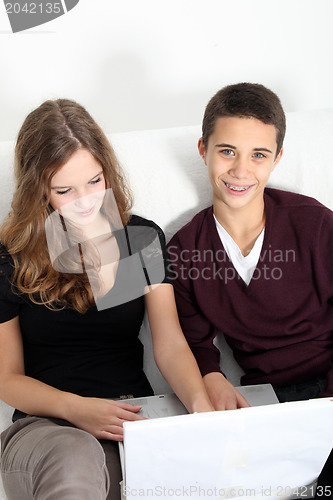 Image of Two teenagers surfing the web