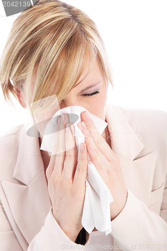 Image of Young woman with a head cold