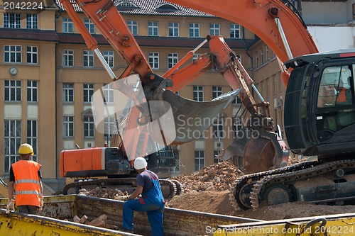 Image of Demolition vehicles at work