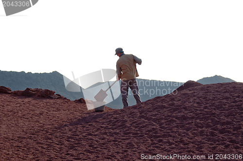 Image of Workman Shoveling Dirt