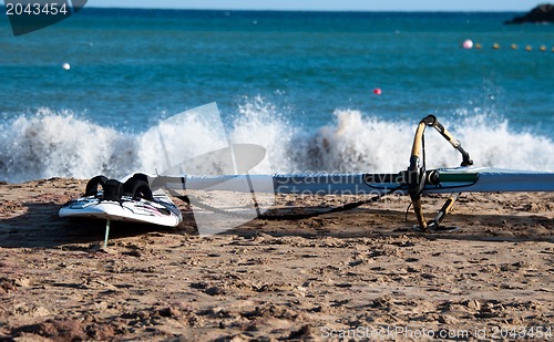 Image of Windsurf Board On The Beach