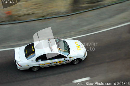 Image of taxi in motion