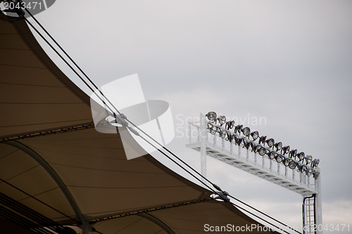 Image of Roof construction of a soccer stadium with lights