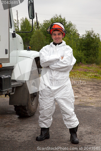 Image of Worker in bio-hazard suit