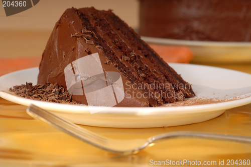 Image of Piece of chocolate cake with chocolate shavings