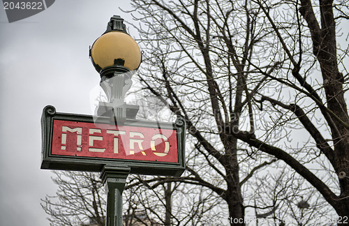 Image of Metro Sign in Paris on a cold December morning