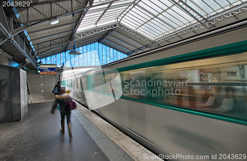 Image of Train departing from a metro station in Paris