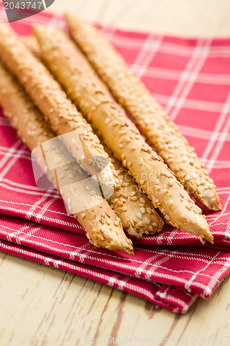 Image of grissini sticks with sesame seeds