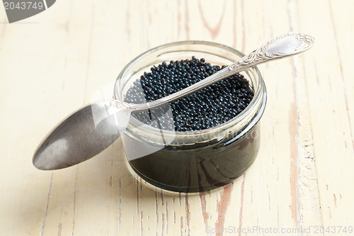 Image of black caviar in glass jar