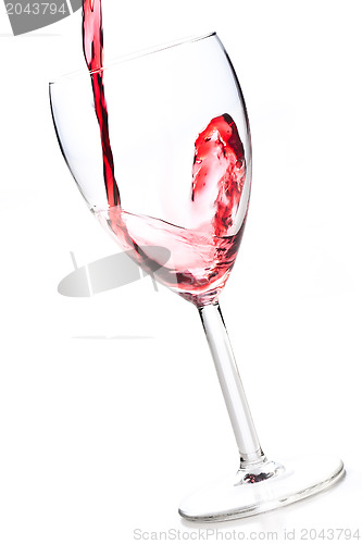 Image of wine pouring into wine glass 
