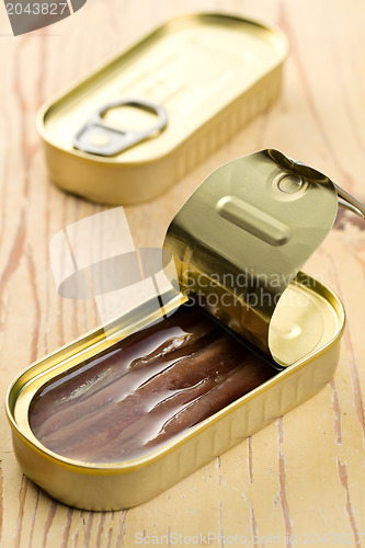 Image of anchovies fillets in tin can