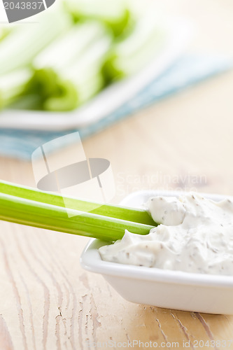 Image of green celery sticks with tasty dip