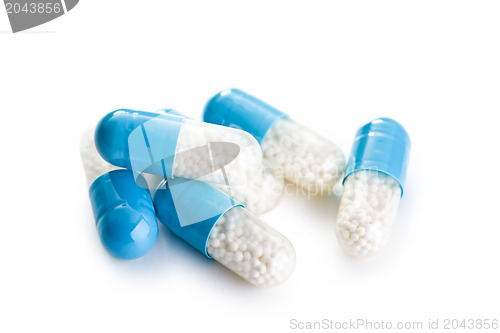 Image of blue medical capsules