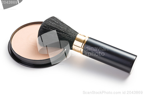 Image of makeup brush and cosmetic powder compact 