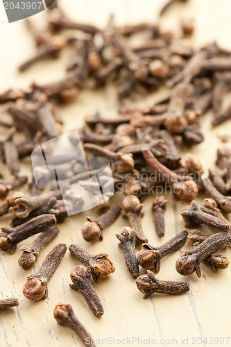 Image of cloves on kitchen table