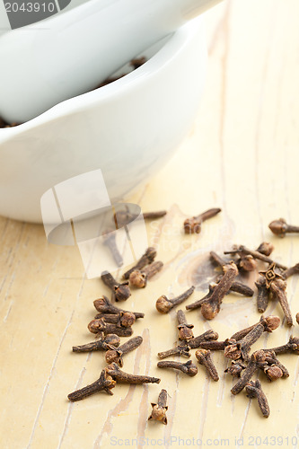 Image of cloves on kitchen table