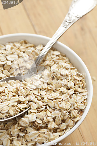 Image of oatmeal on wooden table