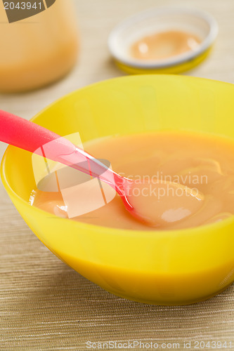 Image of baby food in plastic bowl