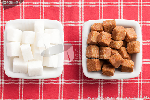 Image of brown and white cubes of sugar