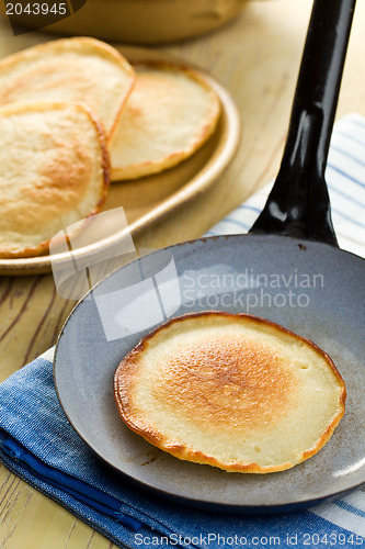 Image of tasty pancake on pan