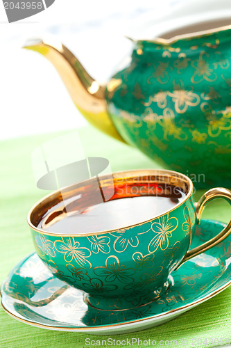 Image of tea in antique porcelain mug