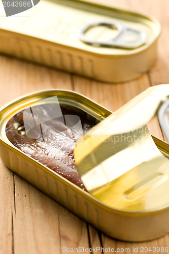 Image of anchovies fillets in tin can