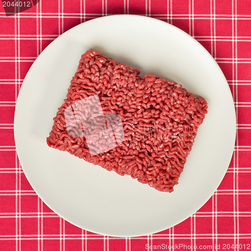 Image of raw minced meat on kitchen table