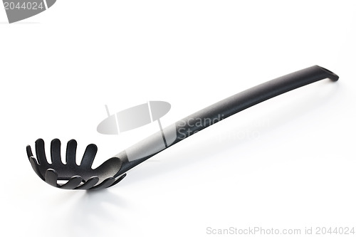 Image of spaghetti draining utensil