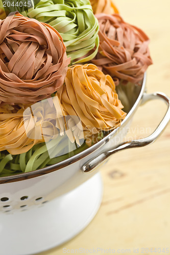 Image of pasta tagliatelle in colander