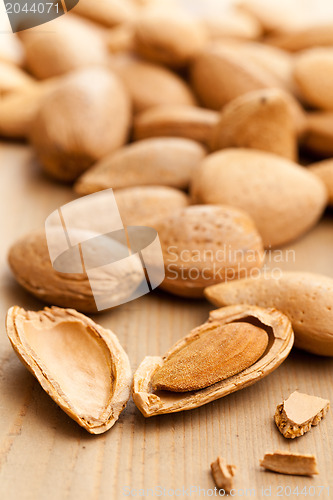 Image of almonds in nutshell